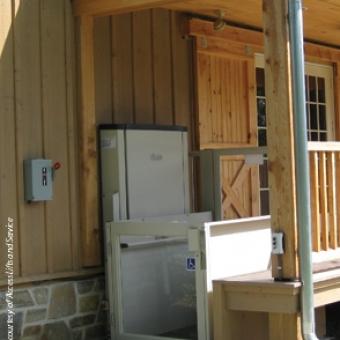 Savaria Multilift Vertical Platform Lift attached to an outdoor deck