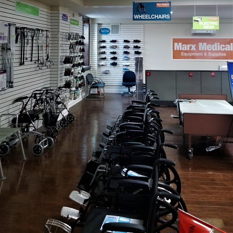Selection of manual wheelchairs inside Philadelphia Marx Medical store