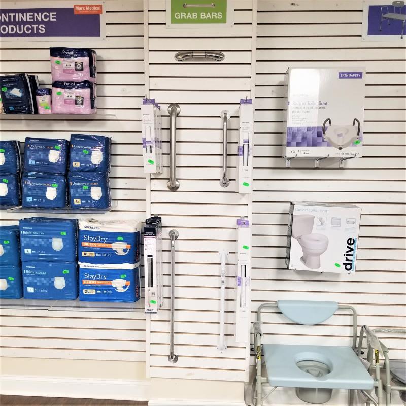 Selection of incontinence products, grab bars and bathroom safety products inside Philadelphia Marx Medical store